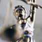 Have a trade register extract translated: A close up of a statue of Justice